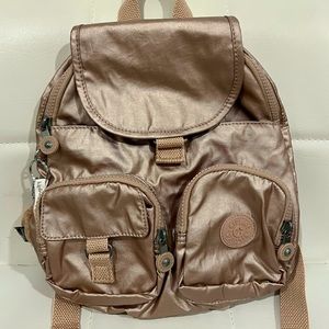 *New without tags* Kipling Lovebug mini backpack in chrome like rose gold